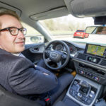 German Federal Minister of Transport Dobrindt tests piloted Audi